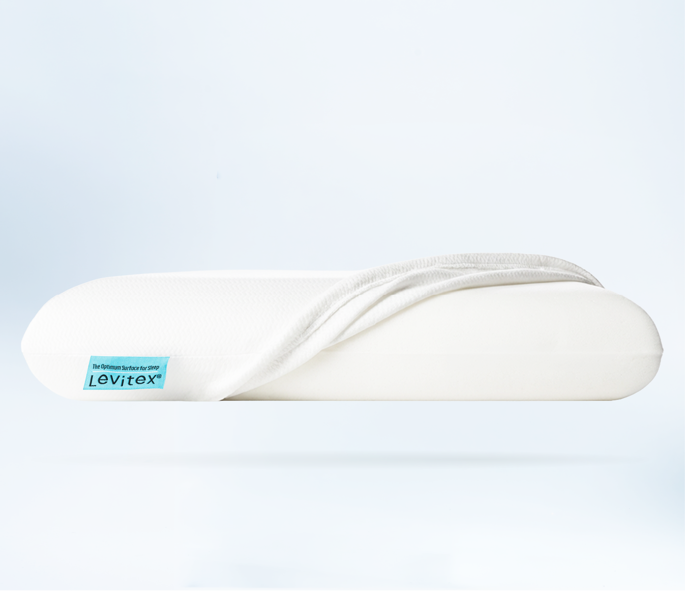 White sleep posture pillow with Levitex branding on a light gray background