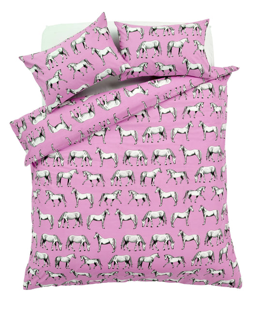 Pink bedspread with horse pattern on a white background