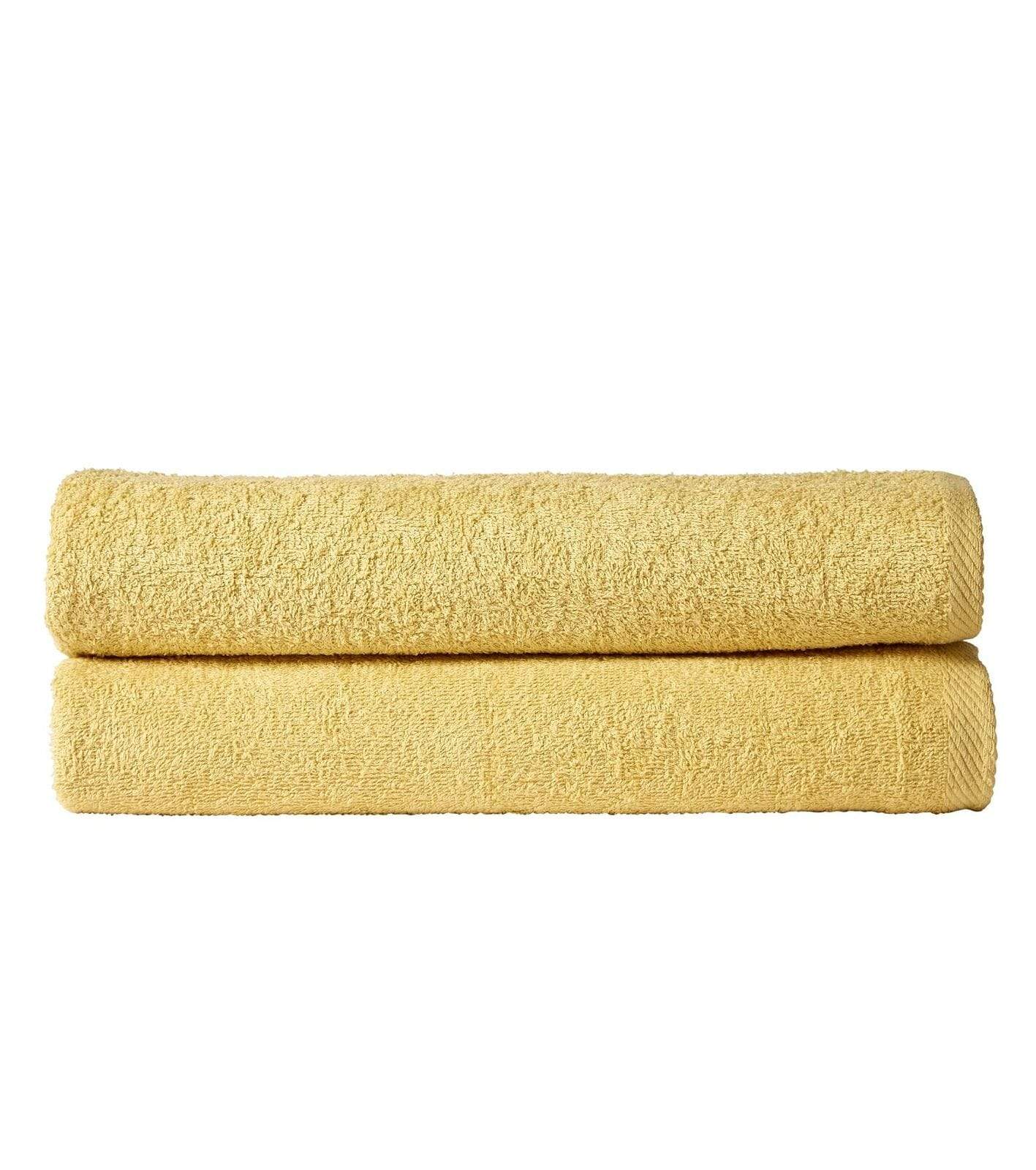 Two folded yellow towels on a white background